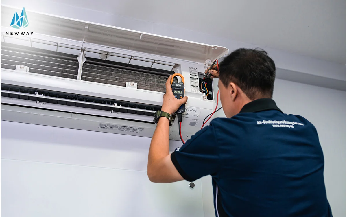 technician testing aircon after the installation