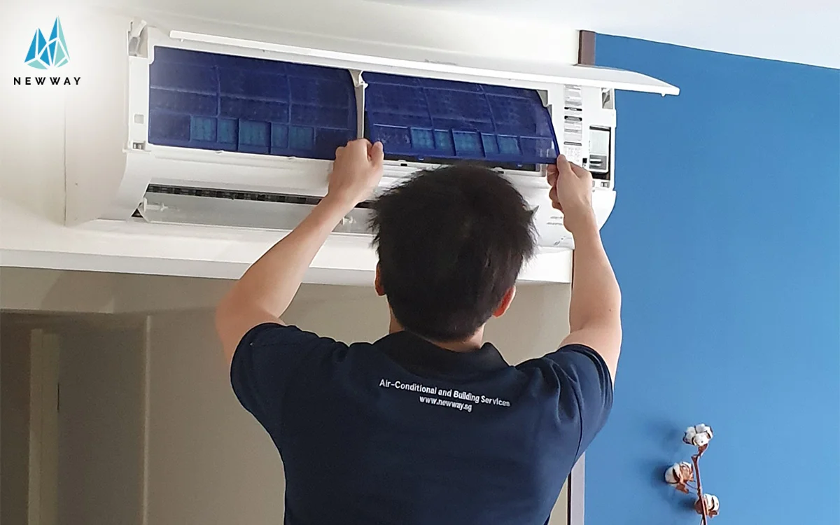 A man installing an aircon
