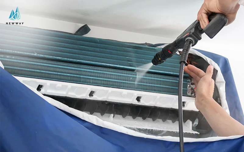 Aircon getting chemical washed to enhance AC efficiency and prevent breakdowns.