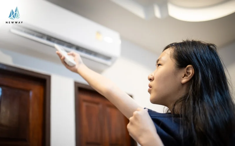 Girl sweating because of a lack of indoor climate control
