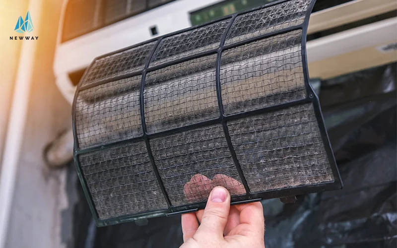 Repairman inspecting HVAC system for faults