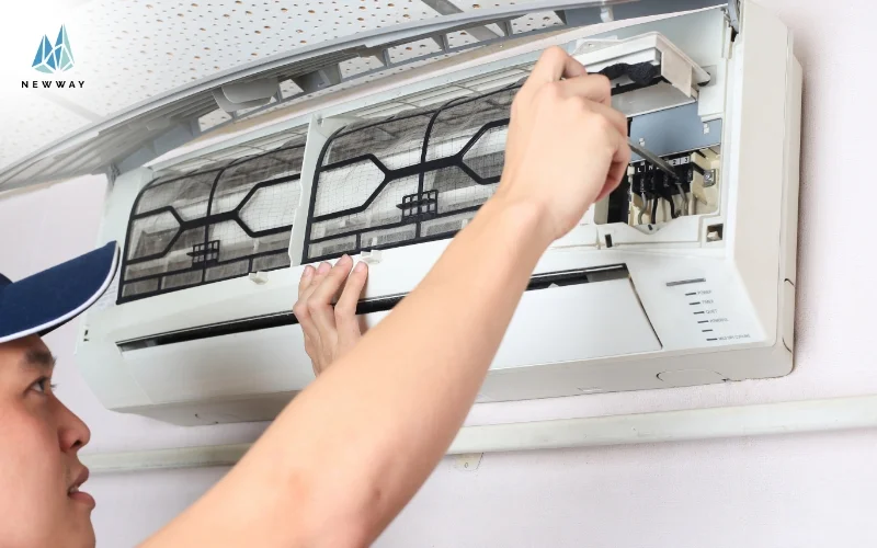Replacing aircon parts and components during maintenance.