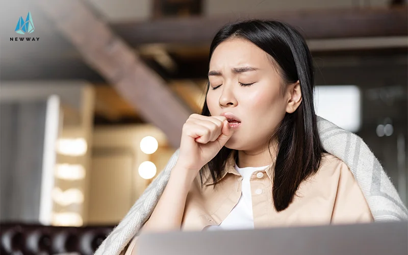 Woman coughing